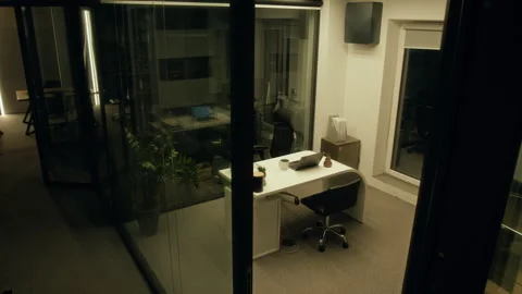 Corporate Manager Office with Lights On Late at Night Filmed on Security Camera Stock Footage 331852854