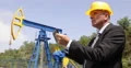Corporate Manager Oil Pump Field Checking Petroleum Installations Using Tablet 4k or 4k+ Resolution