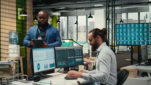 Corporate professional analyzes efficiency through charts and graphs Stock Footage 313908409