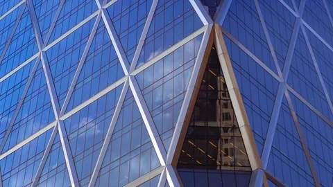 Corporate skyscraper exterior background close up glass facade blue sky windows Stock Footage