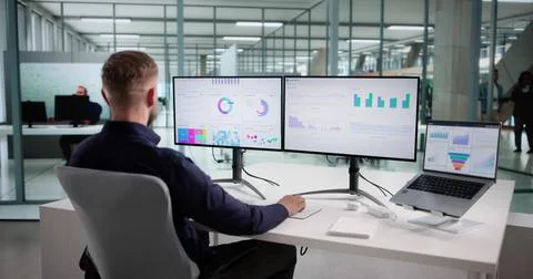 Corporate Strategist Using Predictive Data To Monitor Market Performance Stock Photos