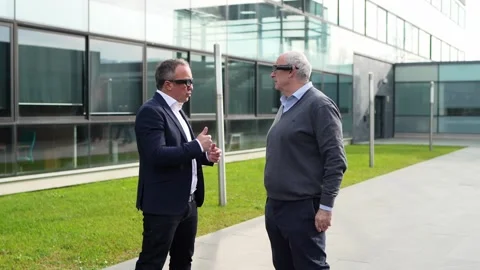 Corporate Team Engaging with Virtual Reality Technology in an Outdoor Setting Stock Footage 275860941