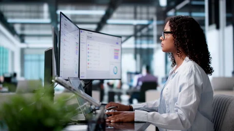 Corporate Trainer Reviewing Employee Progress Charts Stock Footage 340405675