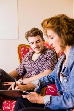 Corporate training interview with a young hispanic entrepreneur with the Stock Photos