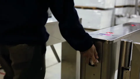 Corporate Worker Passing Through Electronic Access Control Turnstile - 4K Stock Footage 336341176