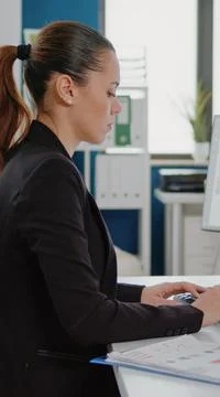 Corporate worker typing on computer keyboard for business Foto stock