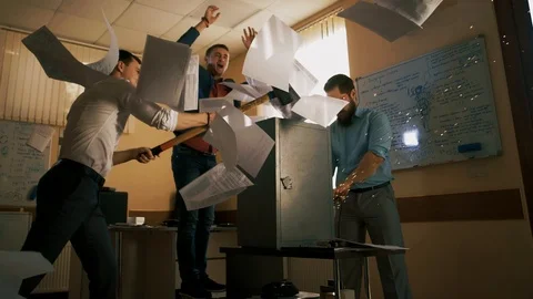 Corporate workers working with heavy construction equipment in the office Stock Footage 105294633