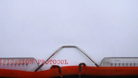 Corpse identification protocol - phrase printed on an old typewriter Video stock 128400433