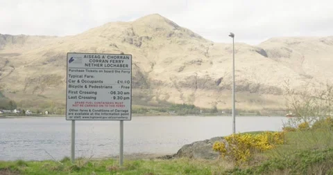 Corran Ferry Pricing Board with Scenic Loch Linnhe Backdrop in 4K Stock-Footage 239776865