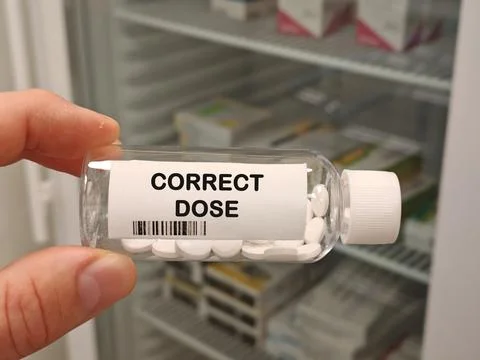 CORRECT DOSE medication dosing topic for dose selection administration and Fotos de archivo