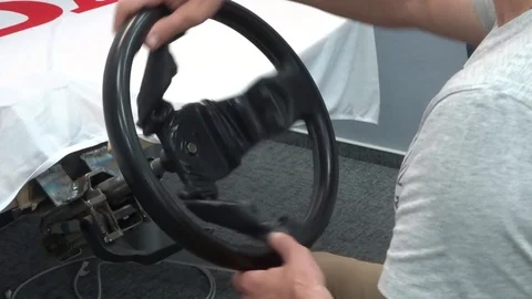 The correct position of the hands on the handlebars is the driving school 動画素材 94913296