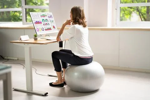 Correct Posture At Desk In Office Stock Photos