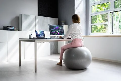Correct Posture At Desk In Office Stock Photos