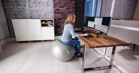 Correct Posture At Desk In Office Stock Photos