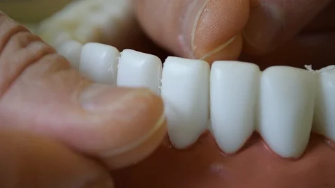 Correct use of dental floss Stock Footage 128453279
