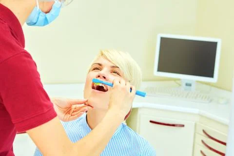The correct use of a tooth brush for perfect oral hygiene Foto stock