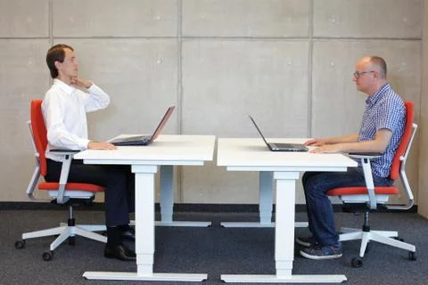 Correction of bad sitting position in office work Stock Photos