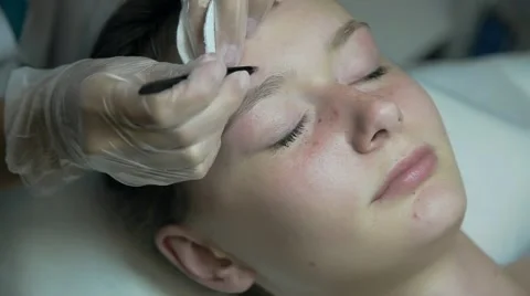 Correction of eyebrows in a beauty salon Stock Footage 66541455