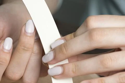 Correction of gel polish. Cut down the old varnish. Remove nail polish. Manic Foto stock