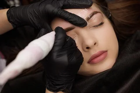 Correction of permanent eyebrow makeup, second PMU procedure Stock Photos