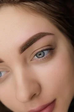 Correction of permanent eyebrow makeup, second PMU procedure Stock Photos