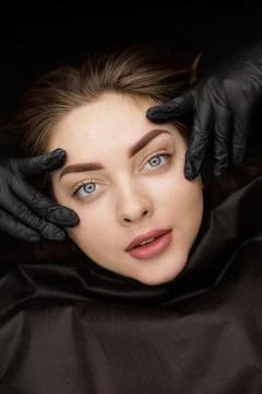 Correction of permanent eyebrow makeup, second PMU procedure Foto stock