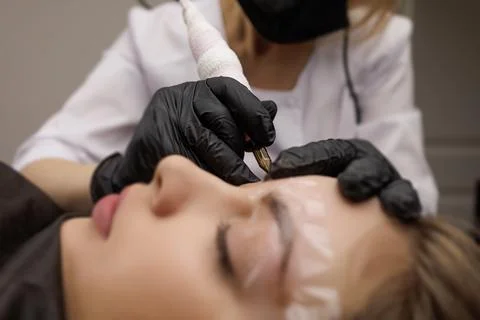 Correction of permanent eyebrow makeup, second PMU procedure Stock Photos