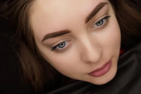 Correction of permanent eyebrow makeup, second PMU procedure Stock Photos