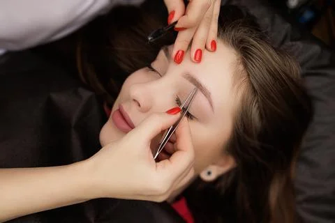 Correction of permanent eyebrow makeup, second PMU procedure Foto stock