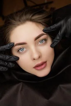 Correction of permanent eyebrow makeup, second PMU procedure Stock Photos