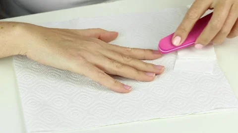 Correction process of female nails with nailfile Stock Footage 54196753