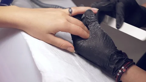 Correction process of female nails with nailfile Stock Footage 97907326