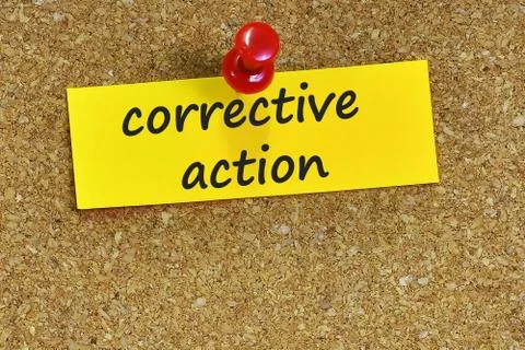 Corrective action  word on notes paper with cork background Stock Photos