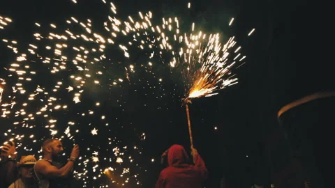 Correfoc Catalan traditional fire run and excited crowd following a devil figure Stock Footage 178850788