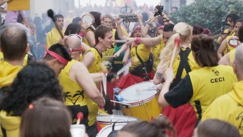 Correfoc drummers surrounded by the crowd in the streets of Barcelona Stock Footage 100389666