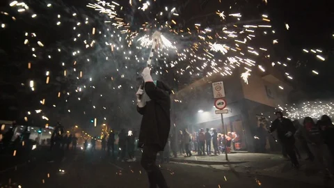 Correfoc fire runs in Barcelona Spain fireworks chaos Video stock 100375493