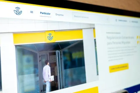 Correos website displaying post office and customer Stock Photos