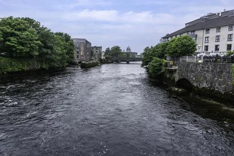 The Corrib River flowing through the centre of Galway City, Ireland. In total Stock Photos