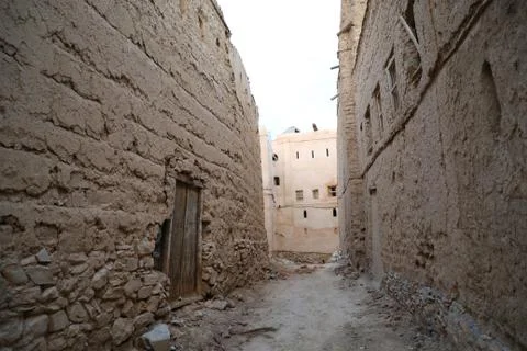A corridor between ancient mud houses in the Sultanate of Oman Stock Photos