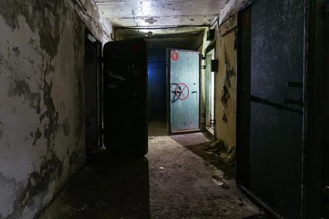 Corridor with blast proof armored doors in the military bunker Stock Photos