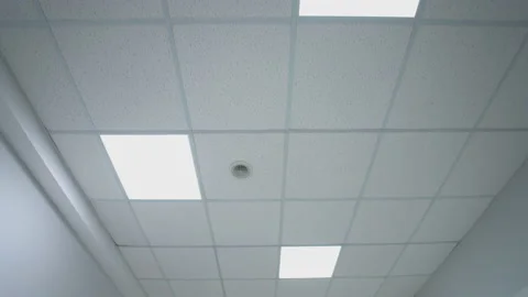 Corridor ceiling with light. Lamps on ceiling in hospital corridor. Bottom view. Vidéo 152556525