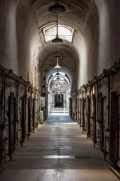 Corridor with cells at the old abandoned Eastern State Penitantiary Stock Photos
