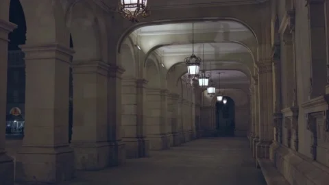 A corridor of columns, illuminated at night by lanterns. Stock Footage 196842668
