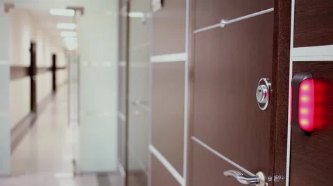 Corridor of data center with flashing alarm on door Video stock 68338786