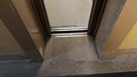 Corridor door details. Elevator gap with wear marks. Inspection scene showing Stock Footage 335143816