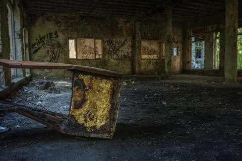 A corridor in an empty, neglected and abandoned building Foto stock