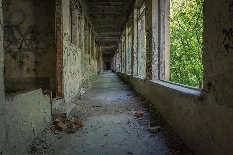 A corridor in an empty, neglected and abandoned building Stock Photos