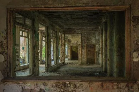 A corridor in an empty, neglected and abandoned building Stock Photos