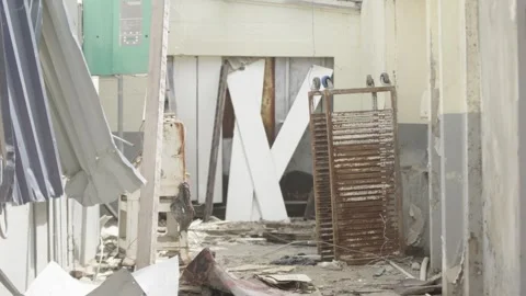 Corridor filled with rubble in the aftermath of hurricane Melissa Stock Footage 340820771