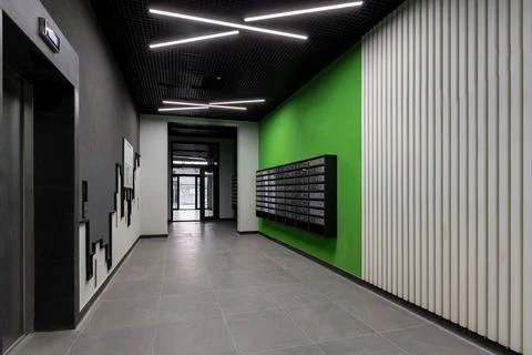 Corridor hall interior, with front door and elevator in many apartment buildi 写真素材